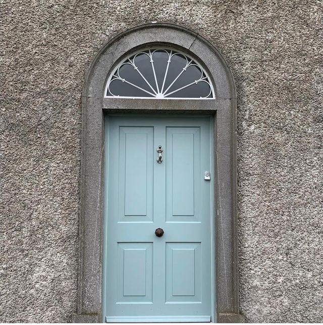 New front door and fanlight — Knocker and knob kept from the old door